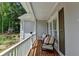 Cozy balcony with brick flooring, seating, and natural light, perfect for relaxation at 9585 Fenbrook Ct, Johns Creek, GA 30022
