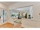 Open-concept living room with a view of kitchen and breakfast nook at 9585 Fenbrook Ct, Johns Creek, GA 30022
