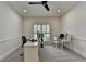 Office with gray carpet and paint, natural light, and contemporary furniture at 9585 Fenbrook Ct, Johns Creek, GA 30022