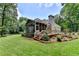 Enclosed sunroom with a high ceiling offering a perfect blend of indoor/outdoor living at 9585 Fenbrook Ct, Johns Creek, GA 30022