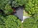 An aerial view of a home with mature trees and an expansive driveway at 2356 Sherbrooke Ne Dr, Atlanta, GA 30345