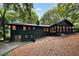 Charming home with a spacious backyard, mature trees and lush landscaping offering privacy and tranquility at 2356 Sherbrooke Ne Dr, Atlanta, GA 30345