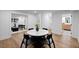Dining area featuring a marble-topped table and modern chairs, which is part of a large living space at 2356 Sherbrooke Ne Dr, Atlanta, GA 30345