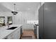 Modern kitchen features stainless steel appliances, white cabinets, and a large island at 2356 Sherbrooke Ne Dr, Atlanta, GA 30345