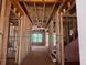 Unfinished home interior showcasing the stud framing and rough openings, ready for customization and finishing touches at 2759 S Waterworks Rd, Buford, GA 30518