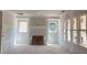 An unfinished living room with many windows to allow a lot of natural light at 2759 S Waterworks Rd, Buford, GA 30518