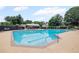 Community pool with lounge chairs and a covered seating area at 640 Windwalk Dr, Roswell, GA 30076