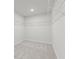 Walk-in closet with white wire shelving at 2645 Mourning Dove Drive (Lot 49), Grayson, GA 30017