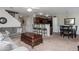 Inviting living room open to kitchen and dining areas, perfect for entertaining at 442 Colonial Walk, Woodstock, GA 30189
