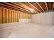 Spacious unfinished basement with concrete walls at 6018 Oakdale Se Rd, Mableton, GA 30126