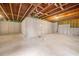 Unfinished basement with concrete walls and floors at 6018 Oakdale Se Rd, Mableton, GA 30126