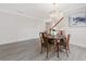 Bright dining room featuring a chandelier and hardwood floors at 6018 Oakdale Se Rd, Mableton, GA 30126
