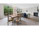 Spacious floor plan showing kitchen, dining and living room with deck access at 6018 Oakdale Se Rd, Mableton, GA 30126
