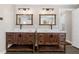 Stylish bathroom with double vanities, modern fixtures and tile floors at 65 Gatewood Dr, Marietta, GA 30068