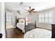 Bedroom features hardwood floors, ceiling fan, and plantation shutters at 65 Gatewood Dr, Marietta, GA 30068