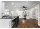 Expansive kitchen featuring hardwood floors, granite counters, and breakfast bar at 65 Gatewood Dr, Marietta, GA 30068