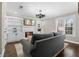 Cozy living room with built-in bookcases, fireplace, and plantation shutters at 65 Gatewood Dr, Marietta, GA 30068