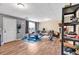 Finished basement with workout equipment, desk, and cozy seating area, perfect for recreation at 218 Depot Ln, Dallas, GA 30157