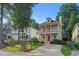 Charming two-story home boasts a double porch and manicured lawn, exuding curb appeal at 2817 Lincoln Dr, Decatur, GA 30033