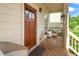 Cozy front porch features a wooden deck, natural accents and ample sunlight perfect for relaxing at 2817 Lincoln Dr, Decatur, GA 30033