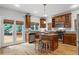 Kitchen with granite counters, stainless appliances, center island, and outdoor access to deck at 2817 Lincoln Dr, Decatur, GA 30033
