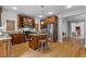 Kitchen with a center island, stainless steel appliances, granite countertops, and wood cabinetry at 2817 Lincoln Dr, Decatur, GA 30033