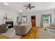 Cozy living room featuring a fireplace, plush seating, hardwood floors, and elegant decor at 2817 Lincoln Dr, Decatur, GA 30033