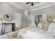 Bedroom with neutral walls, a large decorative bed, and two doorways at 2817 Lincoln Dr, Decatur, GA 30033