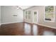 Bright and spacious living room with hardwood floors, ample windows and natural light at 3271 Pennington Dr, Stonecrest, GA 30038