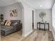 Bright living room with gray walls, light wood floors, and modern decor at 752 Sw Cooper St Sw, Atlanta, GA 30315