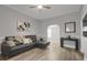 Inviting living room with a contemporary sofa, stylish decor, and neutral tones at 752 Sw Cooper St Sw, Atlanta, GA 30315