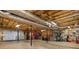 Large unfinished basement with exposed ceiling, concrete floor and storage at 3750 Cannonwolde Dr, Snellville, GA 30039