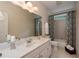 Bathroom features white vanity with great countertop space and shower tub at 3750 Cannonwolde Dr, Snellville, GA 30039