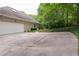 Spacious driveway and a two car garage offers ample parking at 3750 Cannonwolde Dr, Snellville, GA 30039