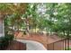 View from the front steps onto the beautifully landscaped yard of this house at 3750 Cannonwolde Dr, Snellville, GA 30039