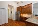Bright kitchen with stainless steel appliances, wood cabinets, and granite countertops at 3750 Cannonwolde Dr, Snellville, GA 30039