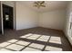 Bedroom featuring carpet, ceiling fan, and access to another room at 4485 Golf Vista Cir, Decatur, GA 30035