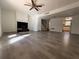 Bright living room with a ceiling fan, fireplace, and hardwood flooring at 4485 Golf Vista Cir, Decatur, GA 30035