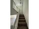 Carpeted staircase with white railing leads to the upper level at 4485 Golf Vista Cir, Decatur, GA 30035