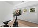 Bright bedroom with natural light, neutral carpet, and exercise bike at 6175 Beaver Crossing Dr, Cumming, GA 30040