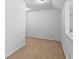 Neutral bonus room with carpet and bright white walls at 6175 Beaver Crossing Dr, Cumming, GA 30040