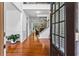 Inviting foyer featuring gleaming hardwood floors, staircase, and elegant details, creating a warm and welcoming entrance at 6175 Beaver Crossing Dr, Cumming, GA 30040