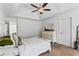 Main bedroom with trey ceiling, white furniture, and large windows at 6175 Beaver Crossing Dr, Cumming, GA 30040