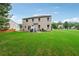 Spacious backyard with a well-maintained lawn, perfect for outdoor activities and enjoyment at 1610 Kenilworth Se Ln, Conyers, GA 30013