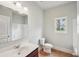 Bathroom with single sink, and shower-tub combo at 1610 Kenilworth Se Ln, Conyers, GA 30013