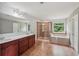Spacious bathroom with double sink vanity, shower and tub at 1610 Kenilworth Se Ln, Conyers, GA 30013