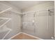 Walk-in closet featuring an abundance of wire shelving, providing ample storage space at 1610 Kenilworth Se Ln, Conyers, GA 30013