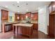 Modern kitchen with stainless steel appliances, granite countertops, and a center island at 1610 Kenilworth Se Ln, Conyers, GA 30013