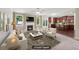 Open-concept living room with a fireplace that flows into the gourmet kitchen at 1610 Kenilworth Se Ln, Conyers, GA 30013