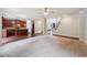 Open concept living area that flows into an eat-in kitchen and a staircase to the upper level at 1610 Kenilworth Se Ln, Conyers, GA 30013